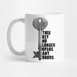 This key no longer opens any doors Mug